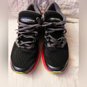 New Balance mens red and black size 11.